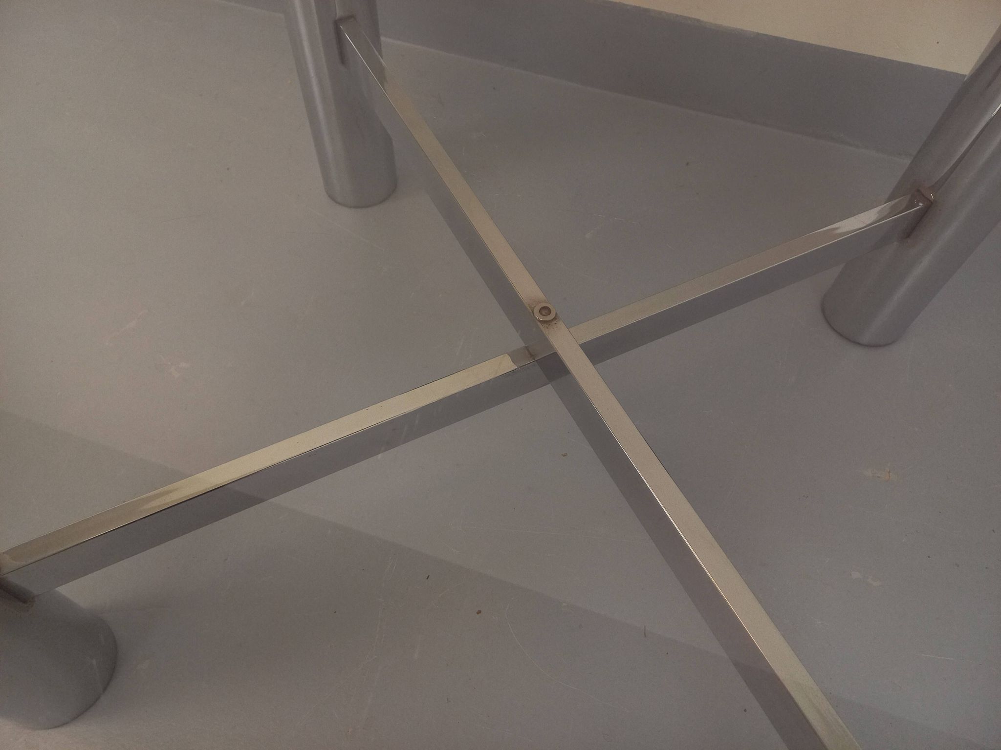 Square Italian vintage Space Age coffee table in smoked glass and metal.