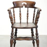 Wooden English antique pub/captain chair from the late 19th century
