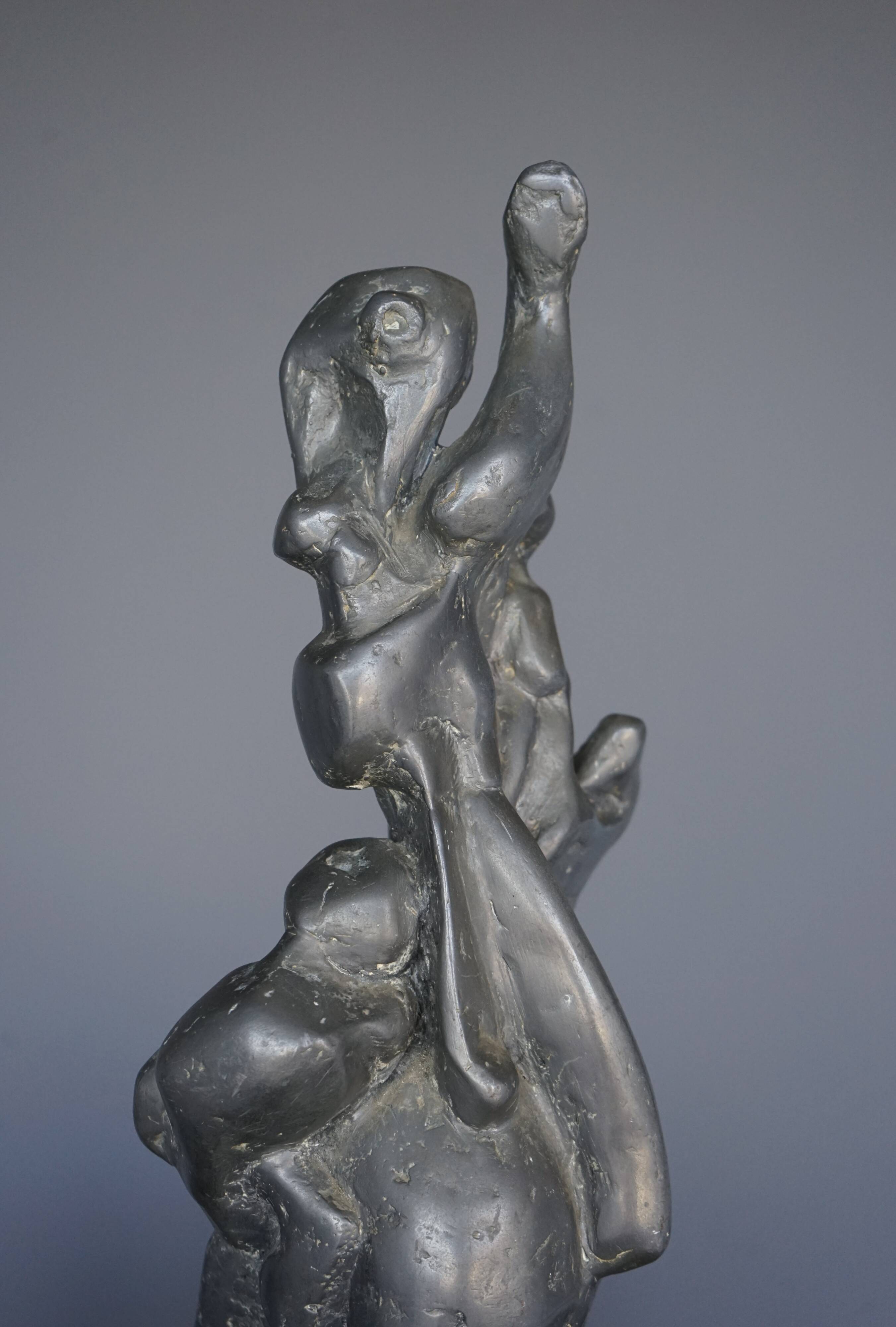 Large abstract lead Sculpture on a marble base. 1960s