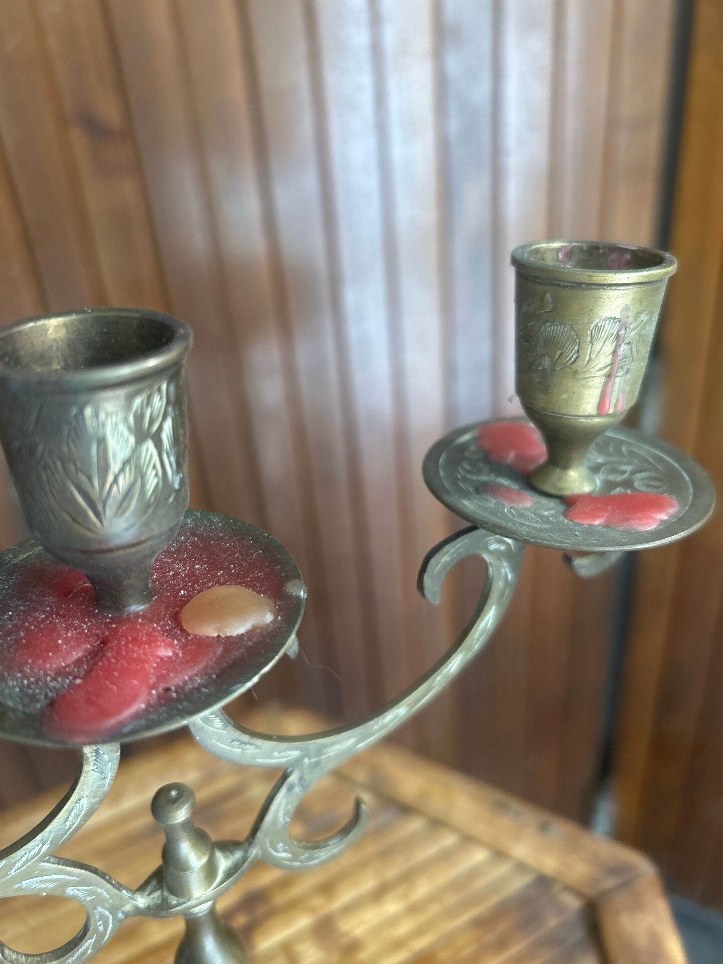 Vintage brass candelabrum engraved with three lights and a snuffer.