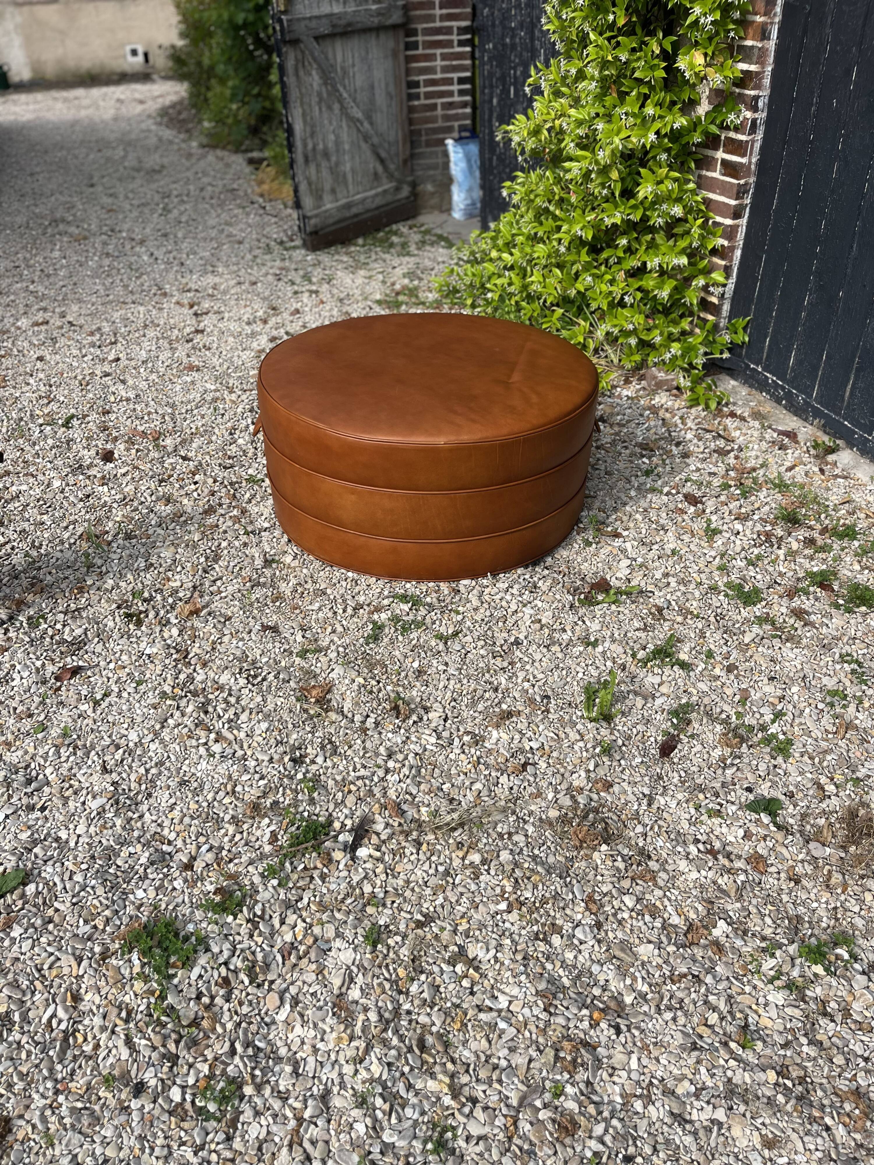 Large round cognac leather pouf
