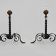 Large pair of wrought iron and brass ball fireplace andirons. 19th century
