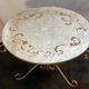 Round coffee table base in gilded wrought iron beautiful top enamelled glass 50s