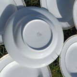 Twelve white porcelain plates