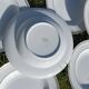 Twelve white porcelain plates