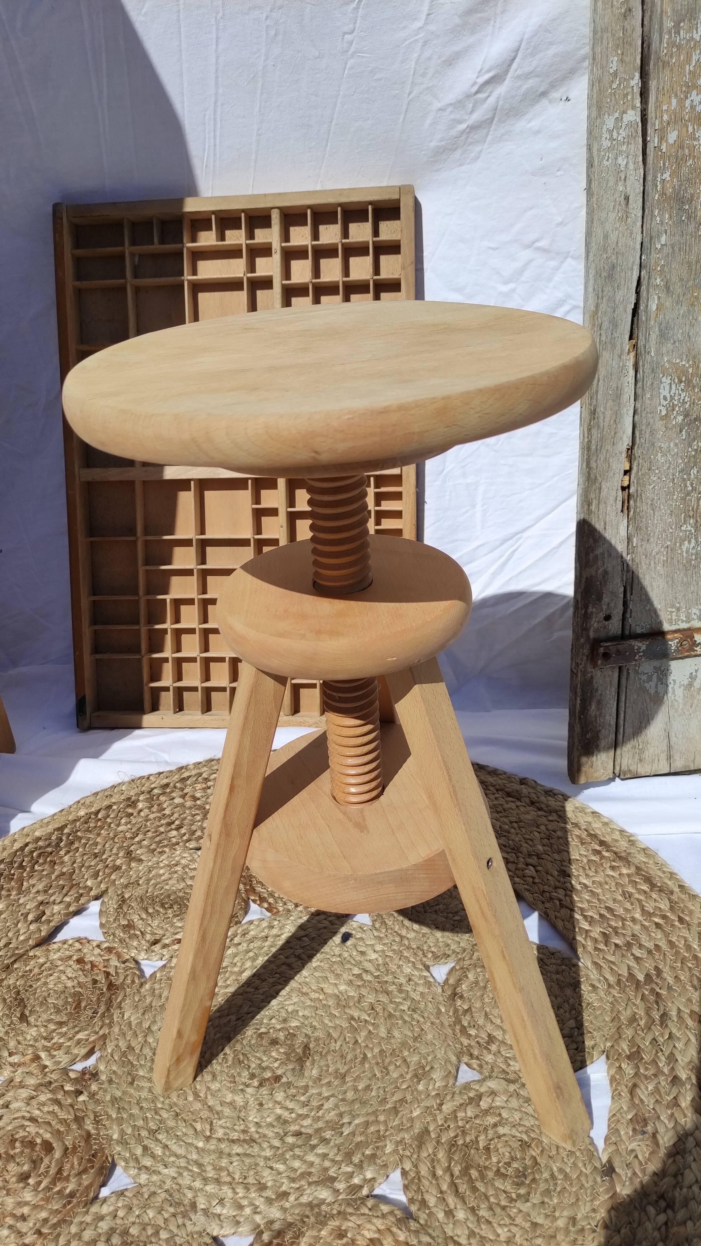 Vintage wooden stool with screws