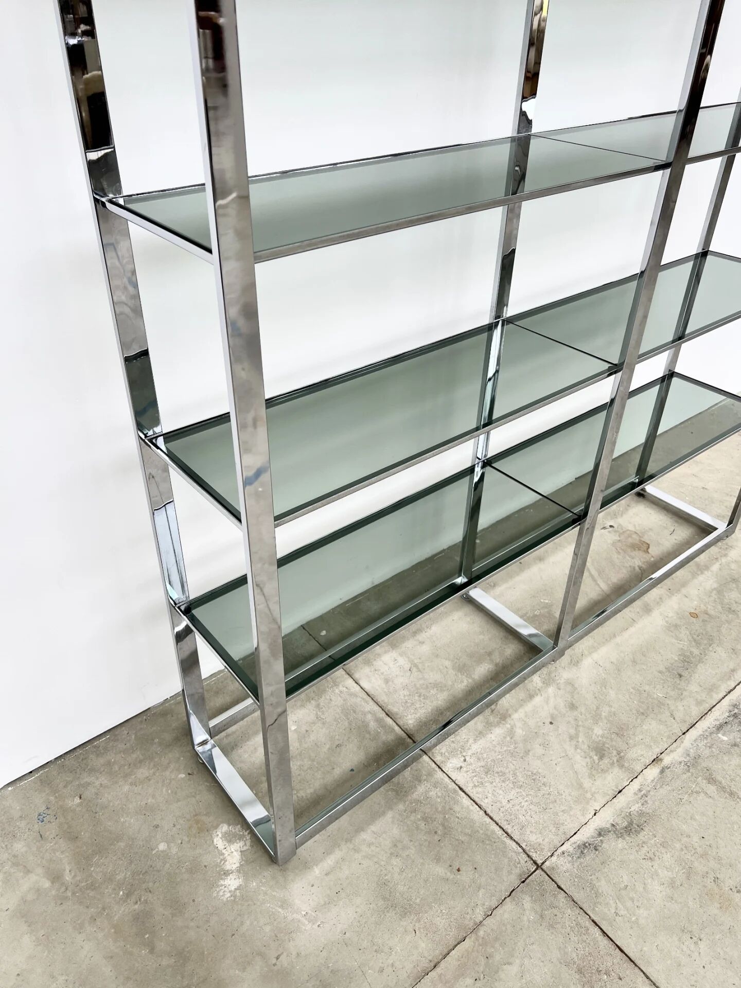 Chrome bookshelf with smoked glass — Italy, 1970s