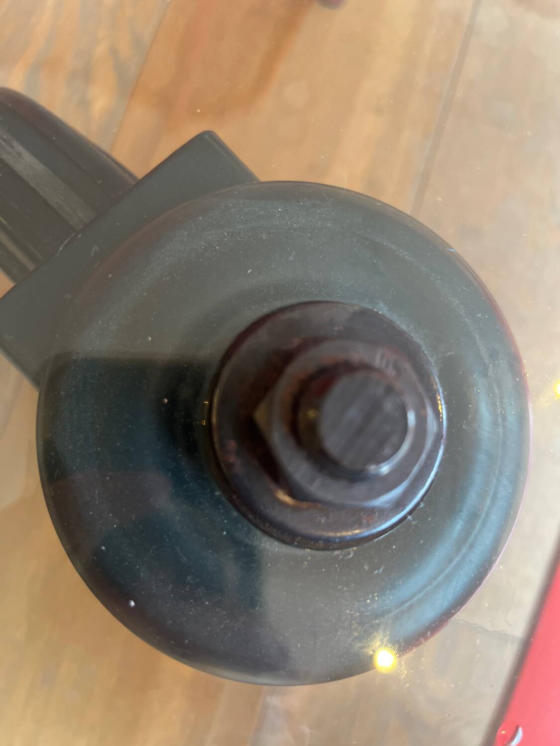 Gae Aulenti coffee table for Fontana Arte, transparent glass top with black cast iron supports, 1980s.