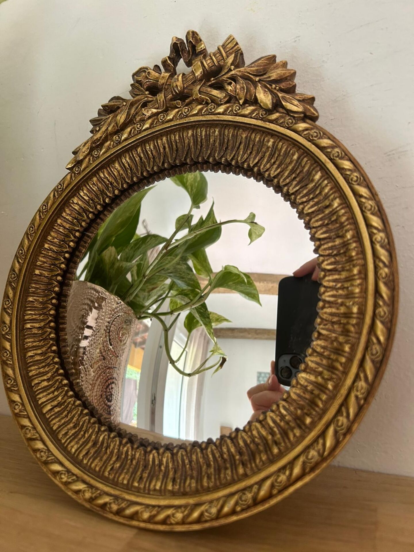 Round golden convex mirror with mouldings - witch's mirror
