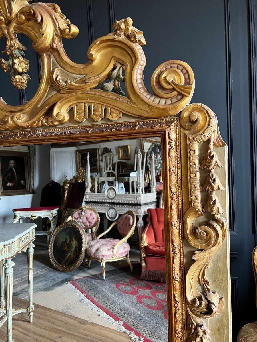Italian mirror from the Napoleon III period in painted and gilded wood