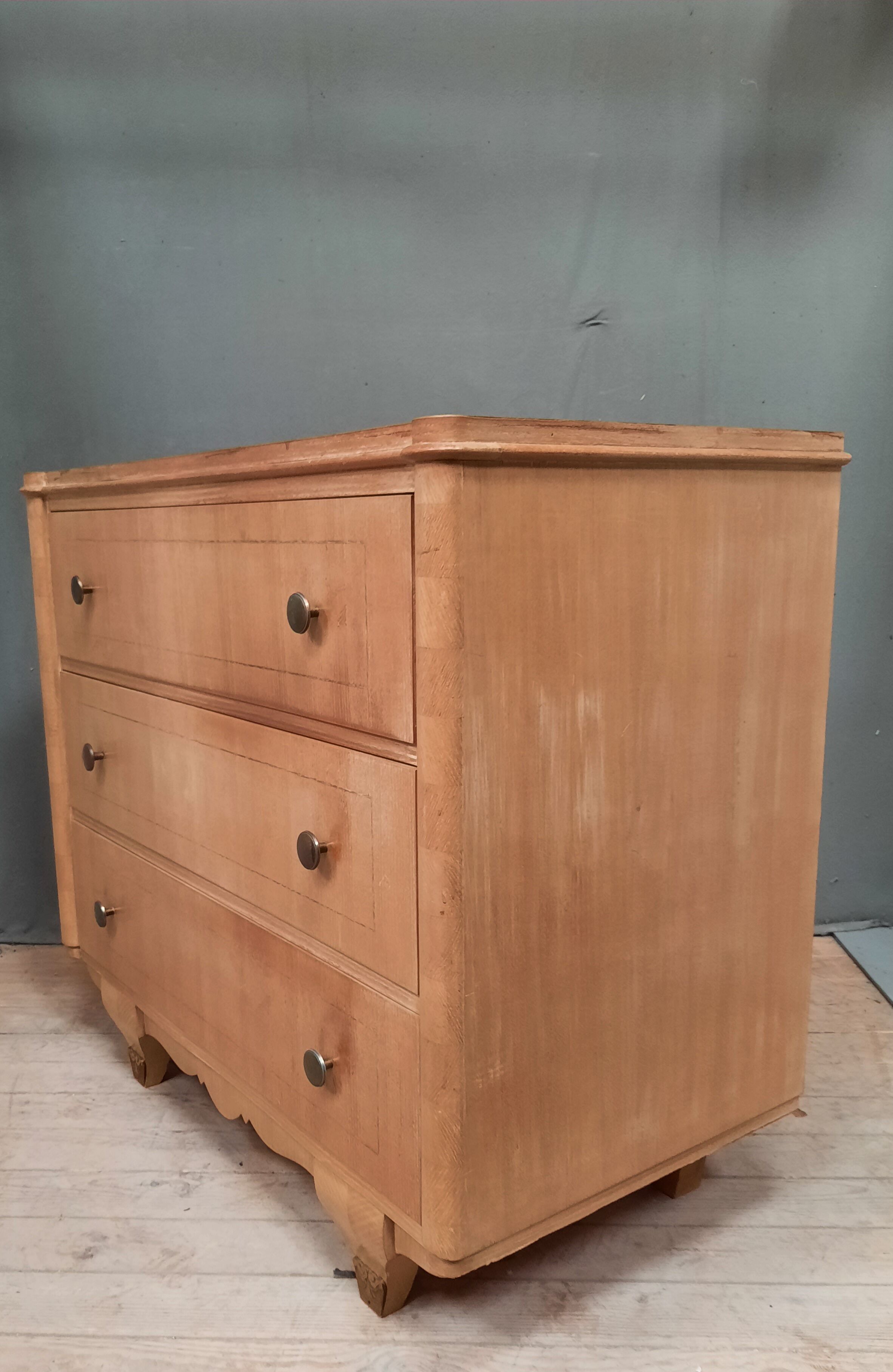 Vintage wooden chest of drawers with clear veneer