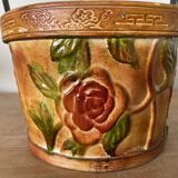 Metal basket with rose patterns