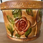 Metal basket with rose patterns