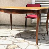Solid wood table with curved legs