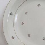 Set of 2 white deep plates with a gold pattern.