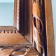Antique mirror in carved wood and mercury 48x63cm