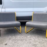 Pair of designer armchairs by Henri Julien