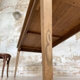 Vintage farm table with spindle legs.