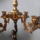 Pair of gilded bronze candlesticks with nude women