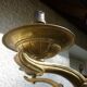 Large antique chandelier in copper and brass