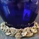 Corolle shaped vase in blown Art glass/Arte Murano Kristall Mery. Cobalt blue on a silver metal-look floral base. Dim 26 x 14 cm