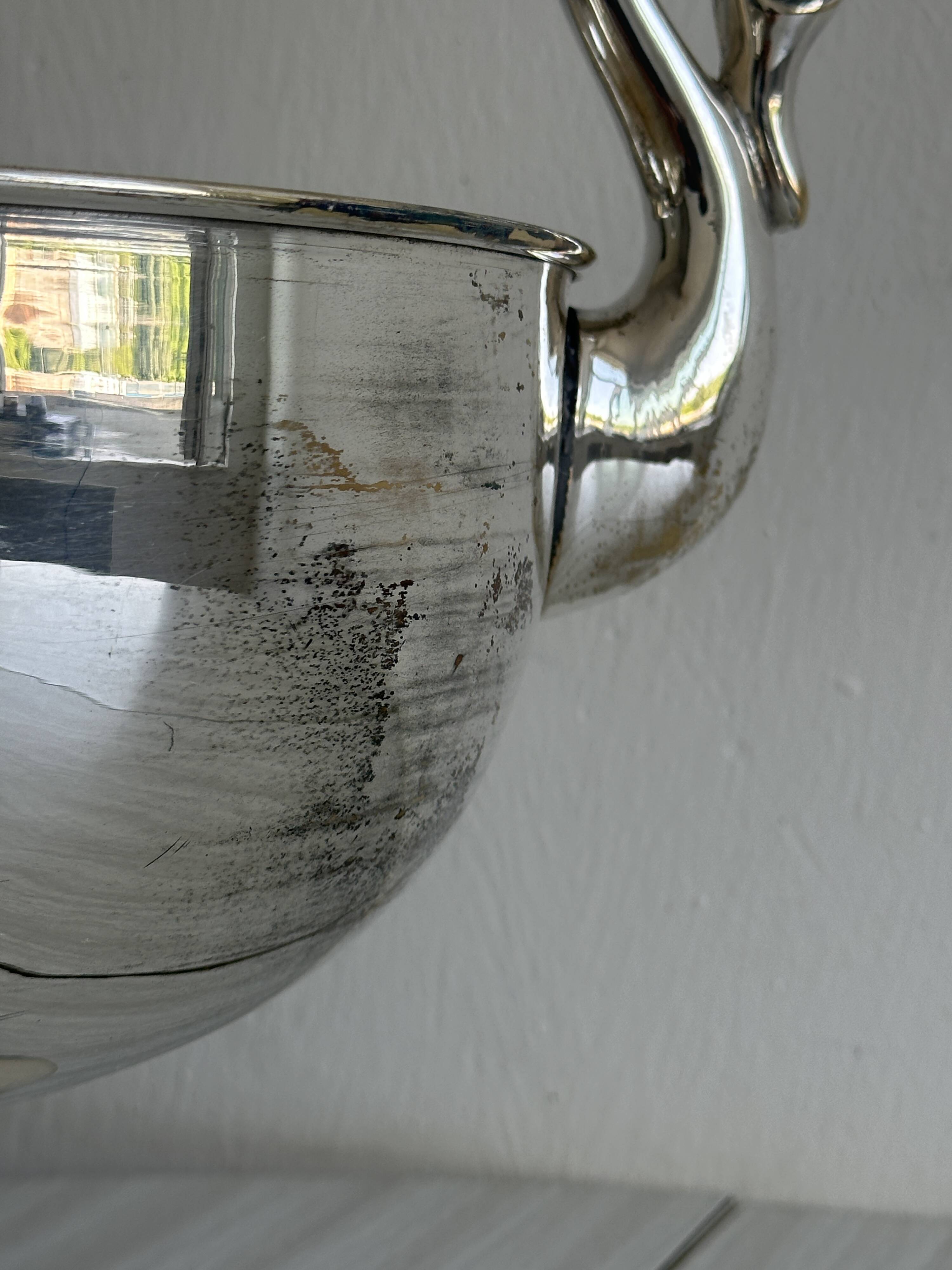 Large glass, metal champagne bucket