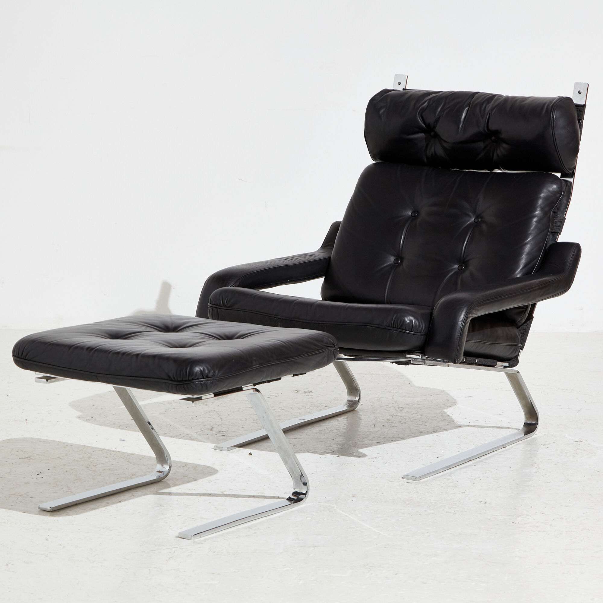 Leather lounge chair with ottoman by reinhold adolf for cor mk9220