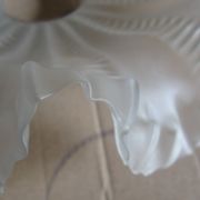 Vintage pleated glass lampshade with claw and socket.