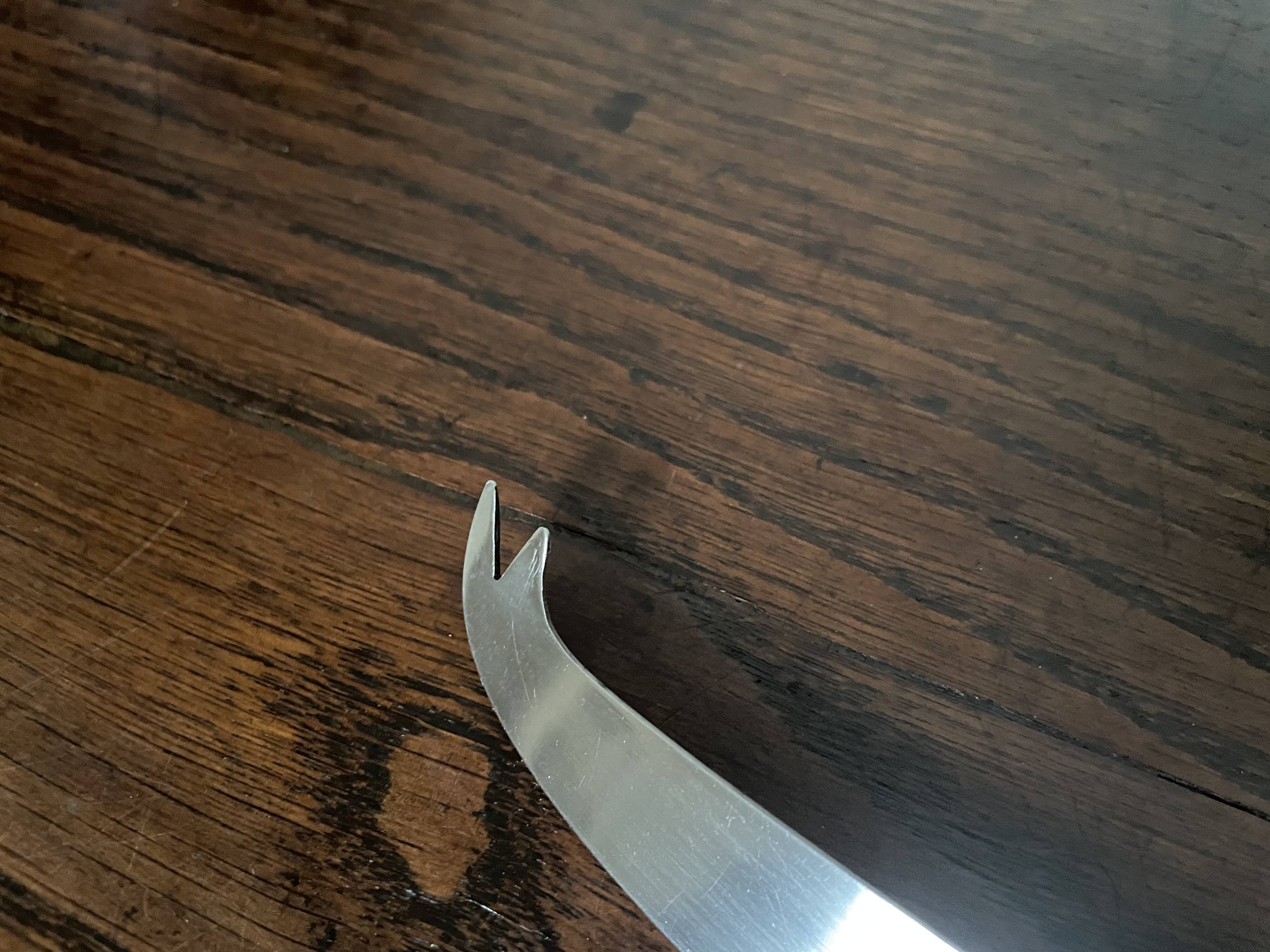 Bamboo handle cheese knife