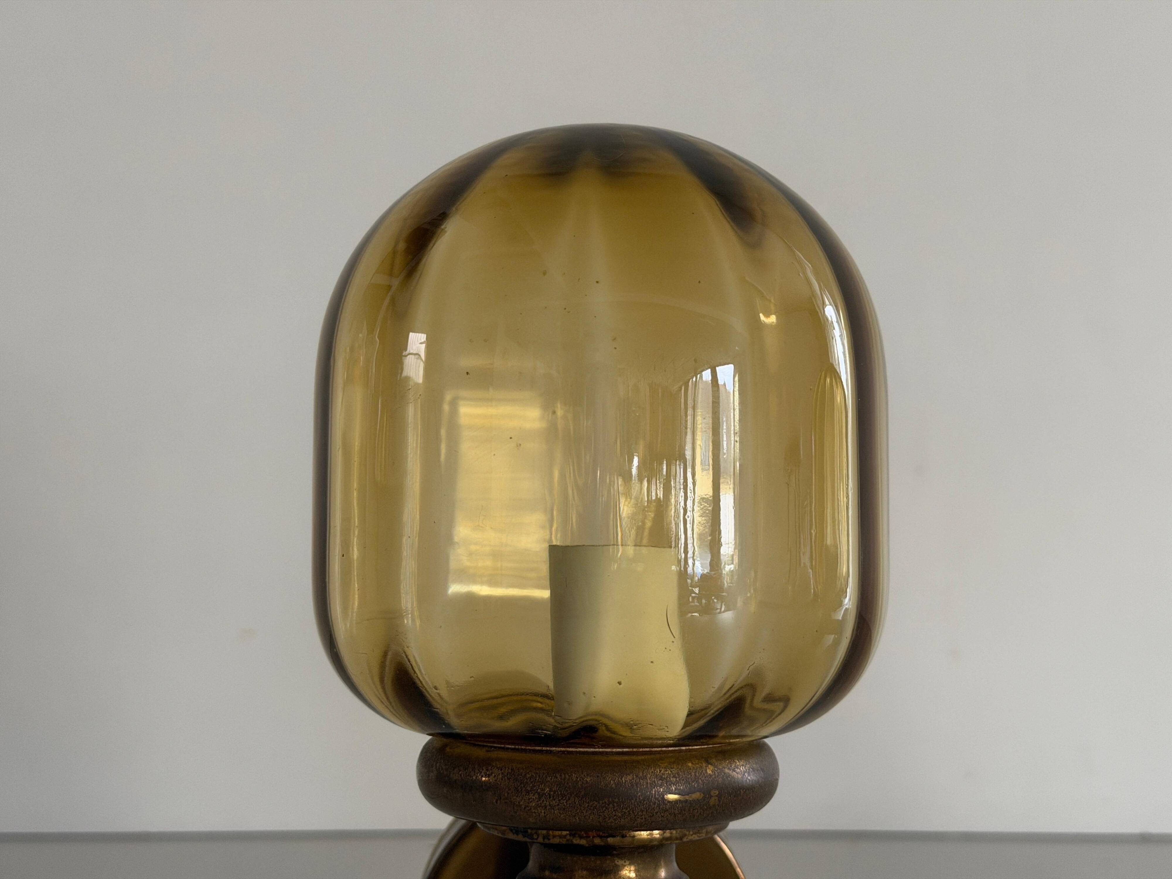 Pair of yellow glass and brass wall lights from the mid-century by N Leuchten, 1960s, Germany.
