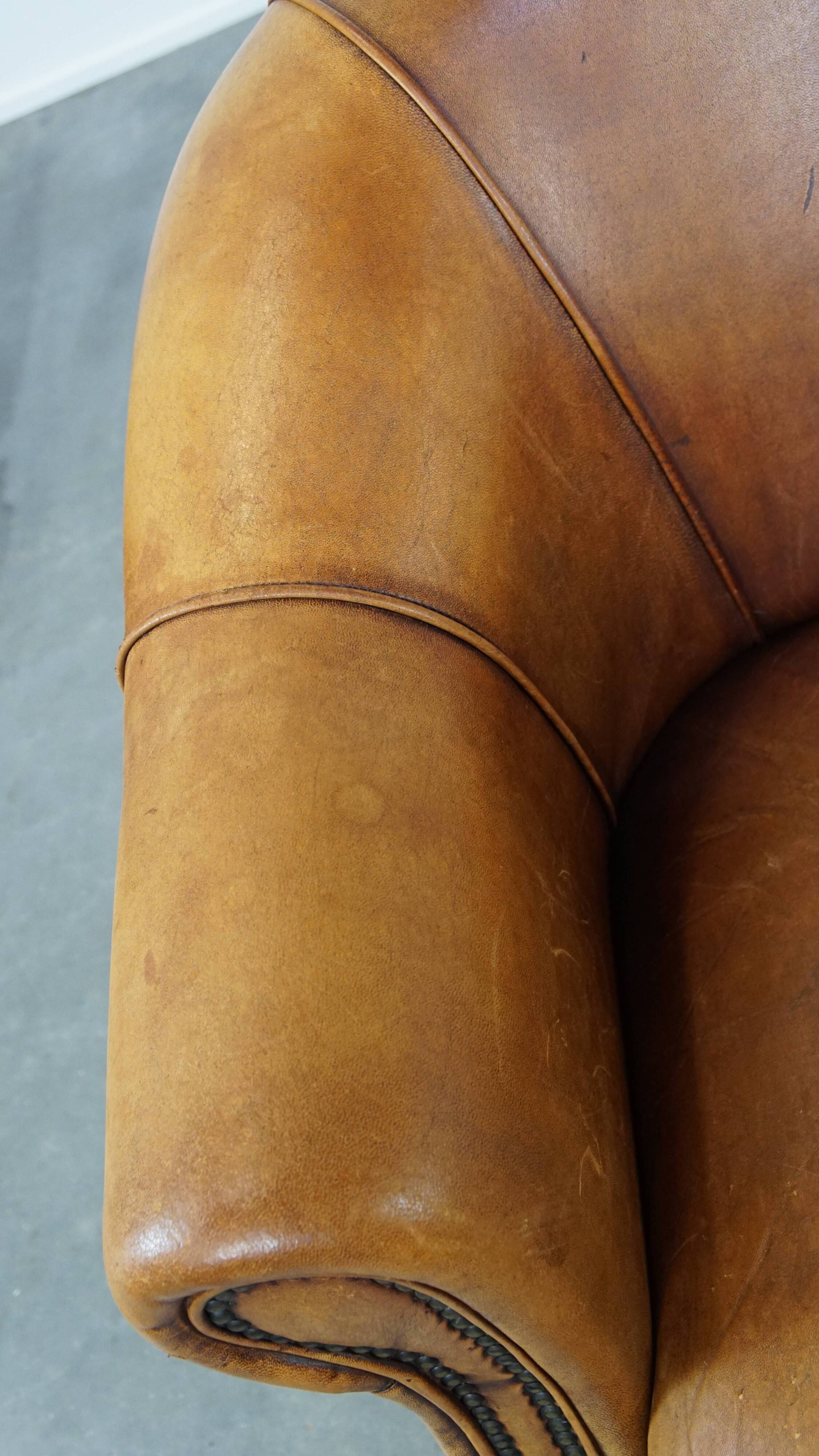 Fauteuil club vintage en cuir de mouton cognac clair