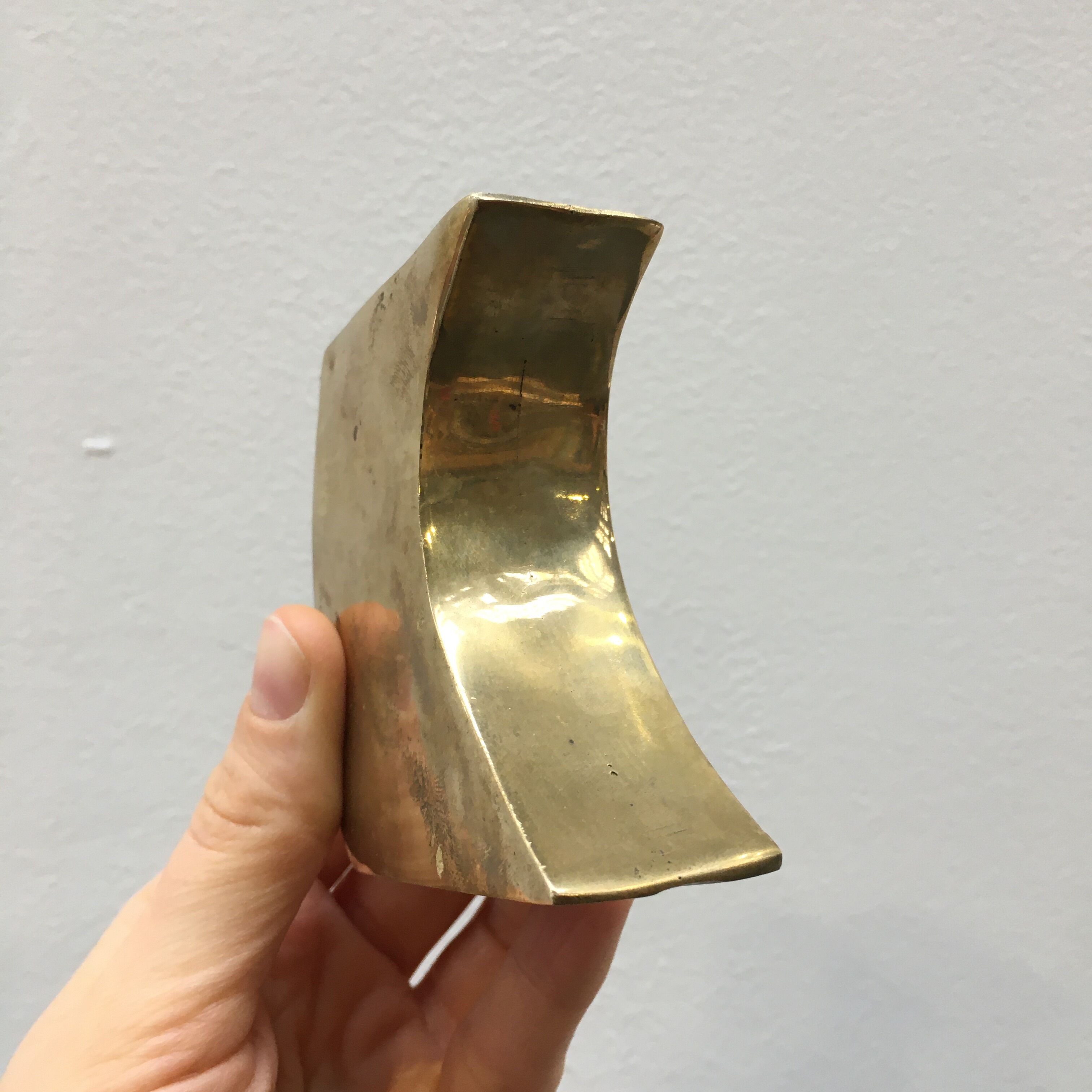 Pair of bronze candle holders by Monique Gerber