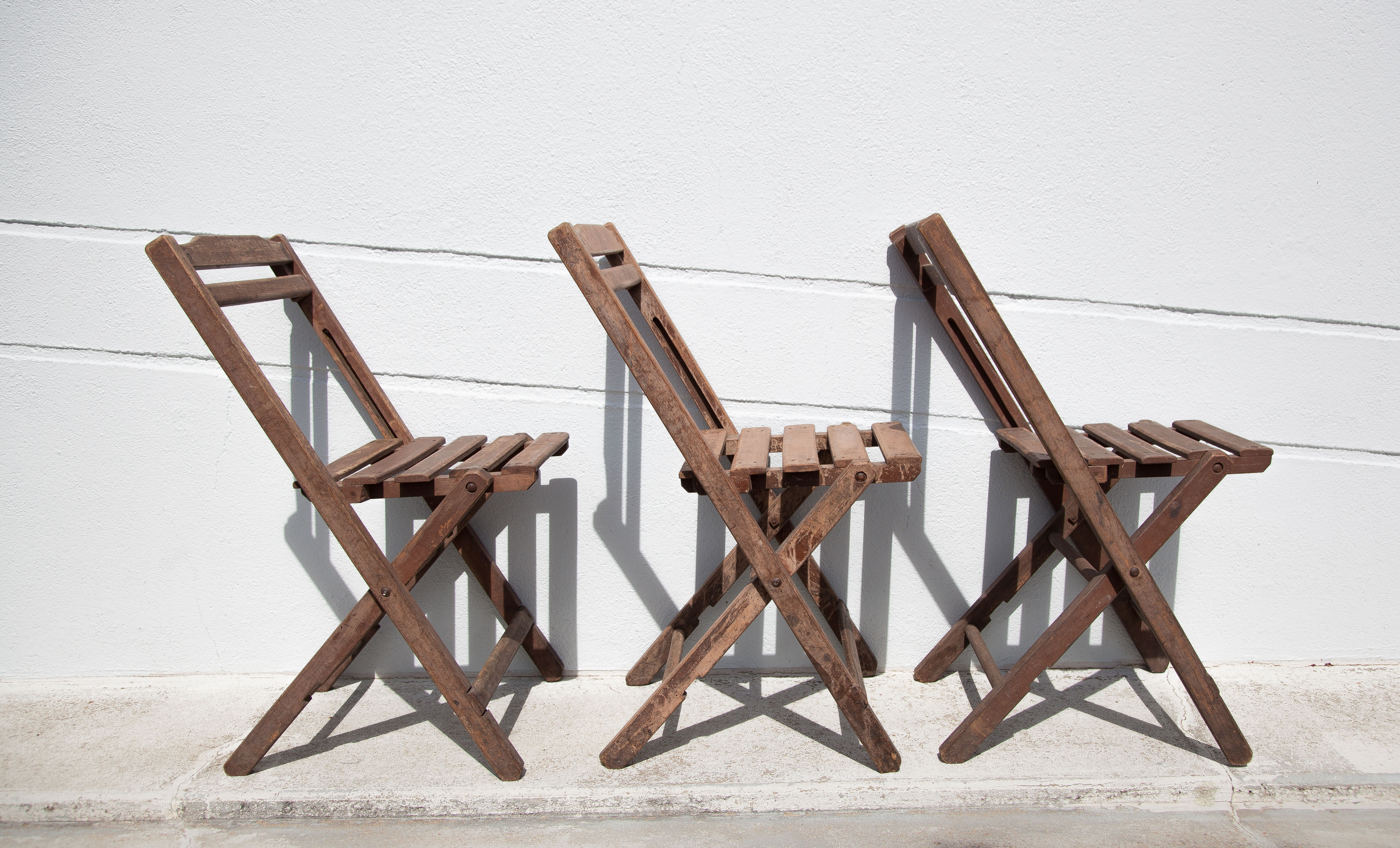 Set of 3 wooden folding chairs