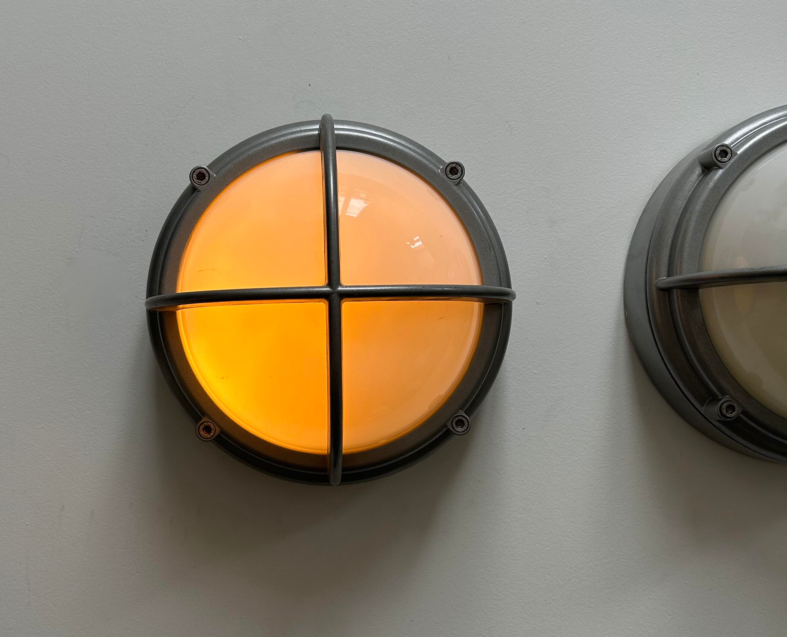 Pair of vintage SYOT, Louis Poulsen, aluminum