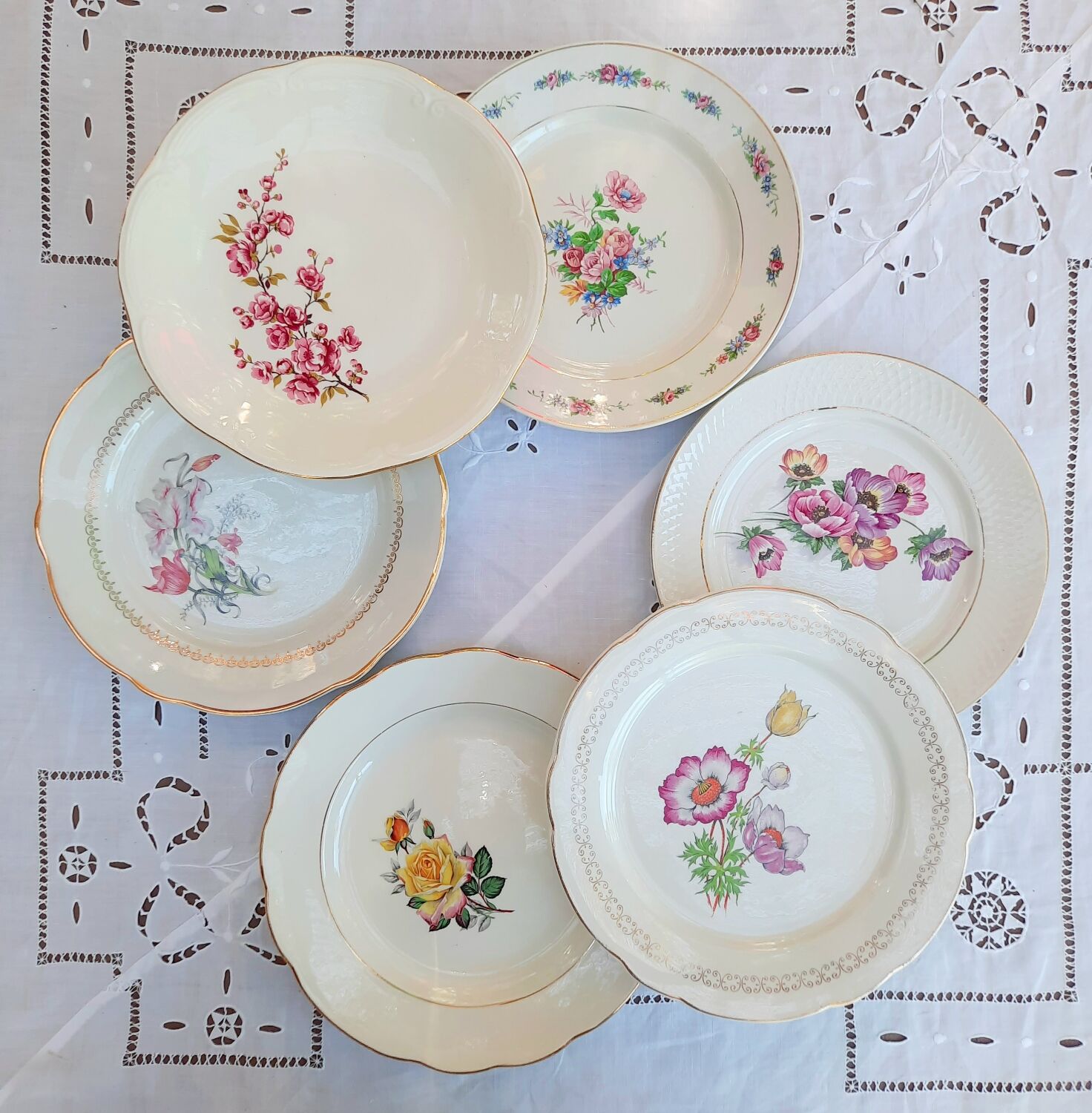 Old flat plates mismatched in earthenware