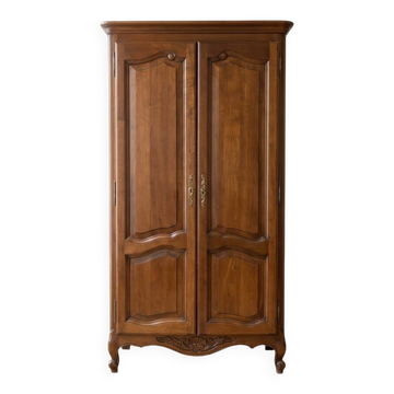 Antique wooden wardrobe in vintage style