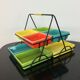 Black metal appetizer set with colorful ceramic ramekins