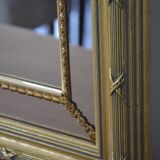Large mirror with gilded and carved wooden glazing beads