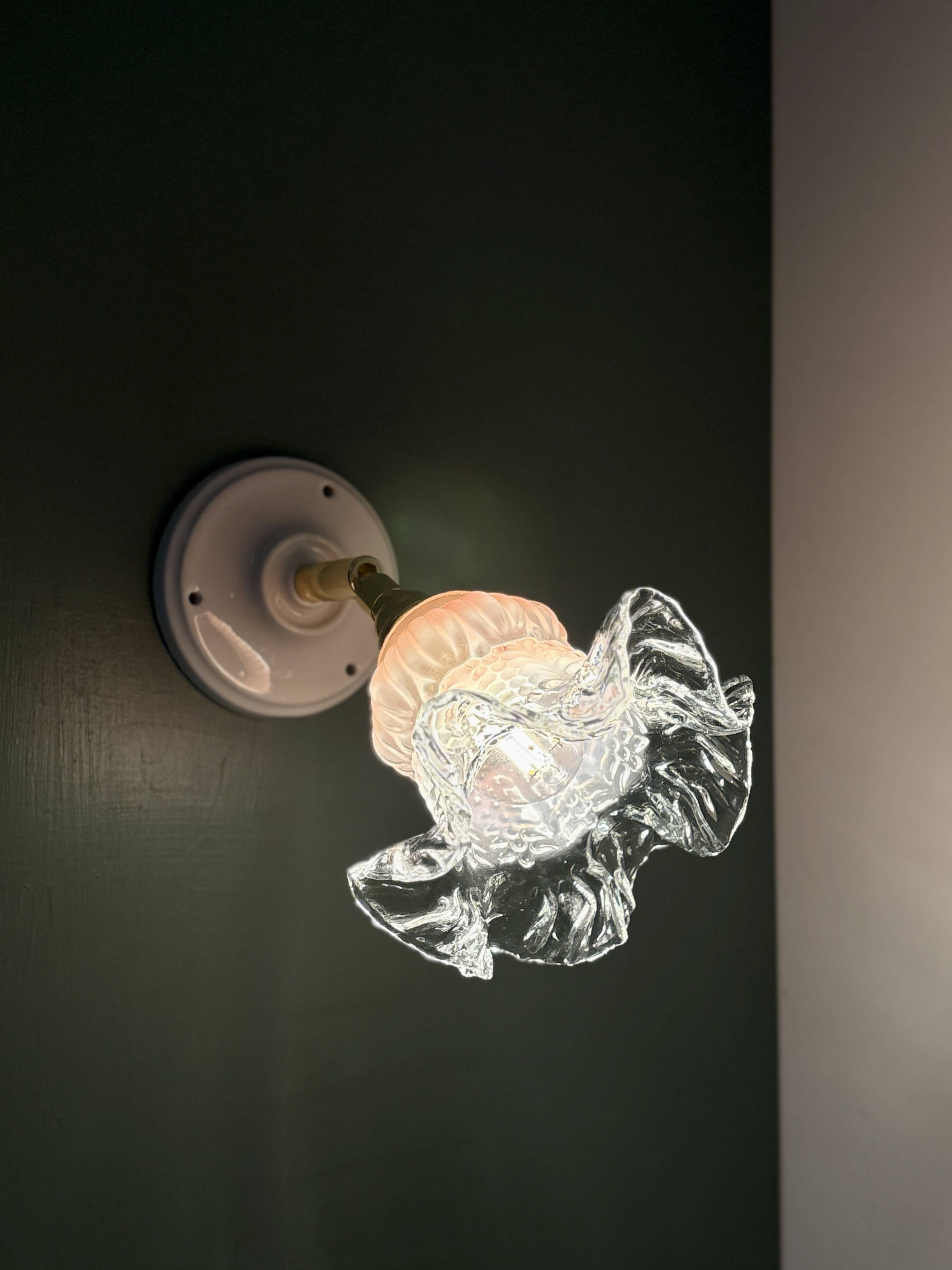 Vintage pink and clear glass tulip wall light.