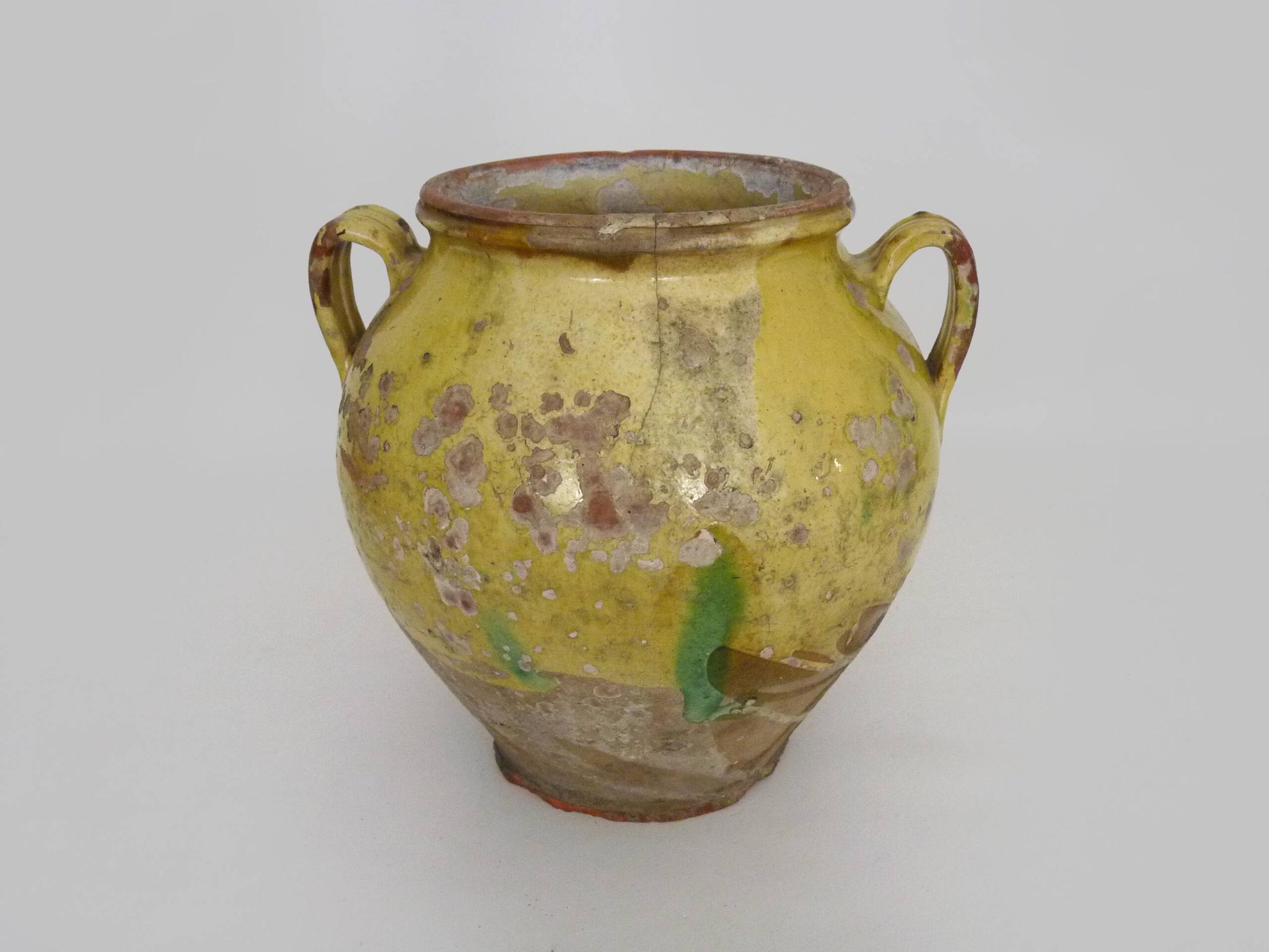 Magnificent glazed yellow confit pot, south-west of France. 19th century.