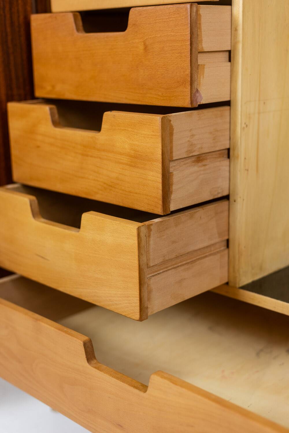 Pair of mahogany veneer and black lacquered iron cabinets. 1950s.