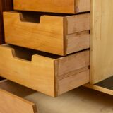 Pair of mahogany veneer and black lacquered iron cabinets. 1950s.