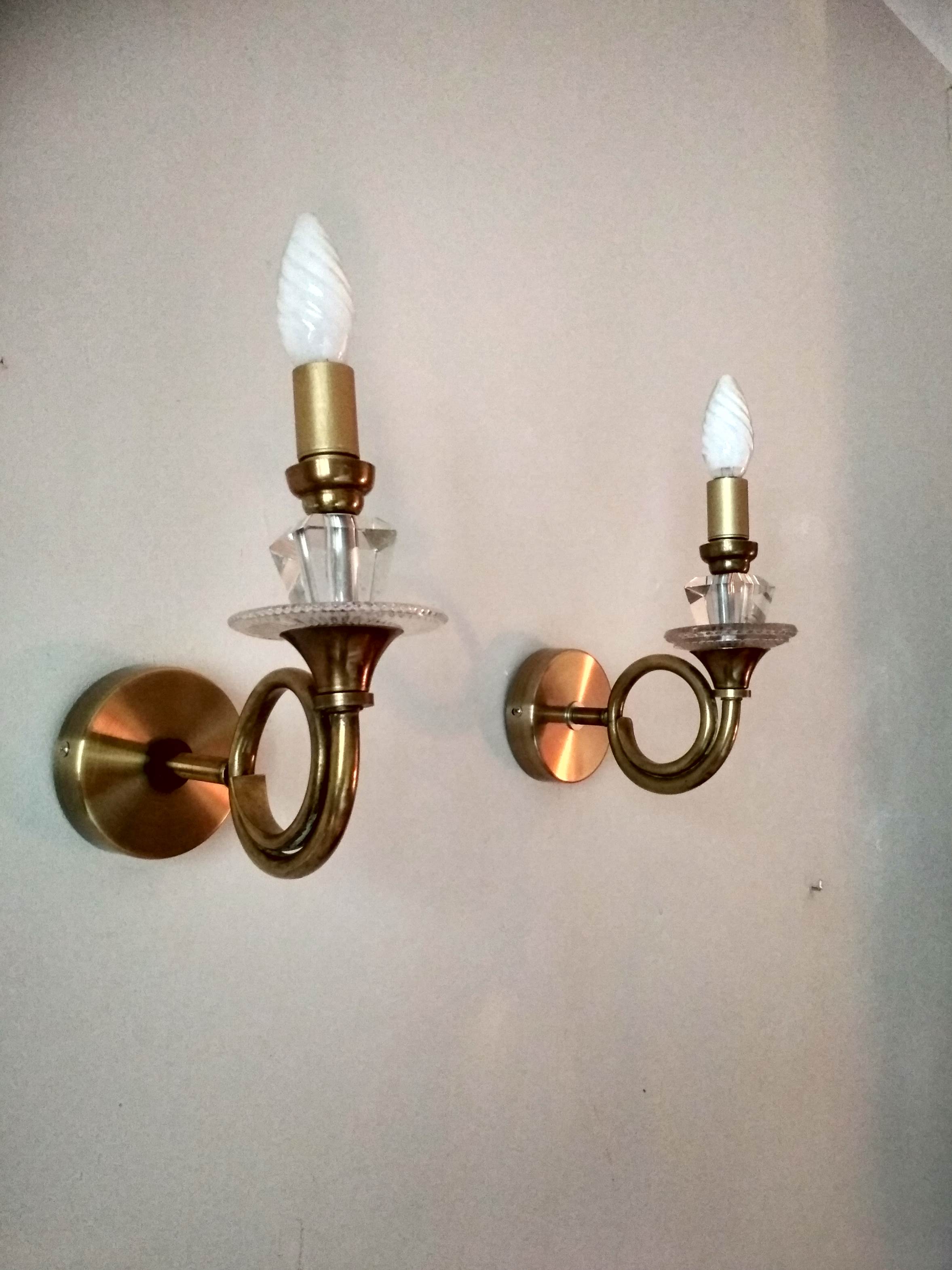 Pair of old brass wall sconces