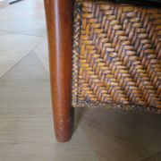 Woven rattan armchair and exotic wood in colonial style, 1980s.
