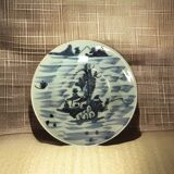 Asia, celadon porcelain plate with fisherman decor, late 19th century