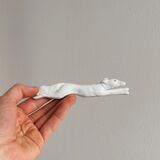 Porcelain animal knife holder.