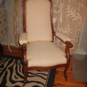 Armchair and its footrest