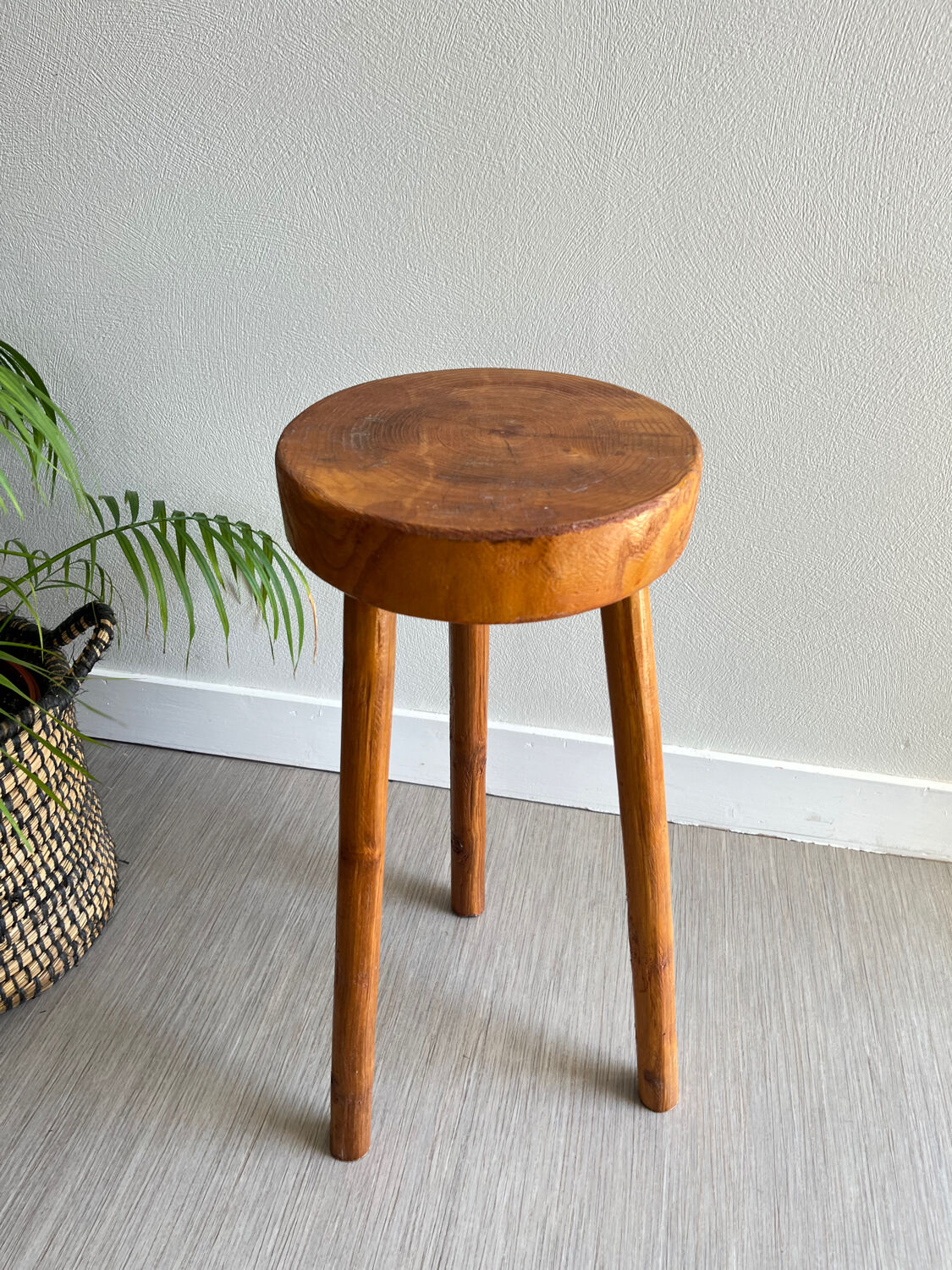 Tripod stool in a brutalist style