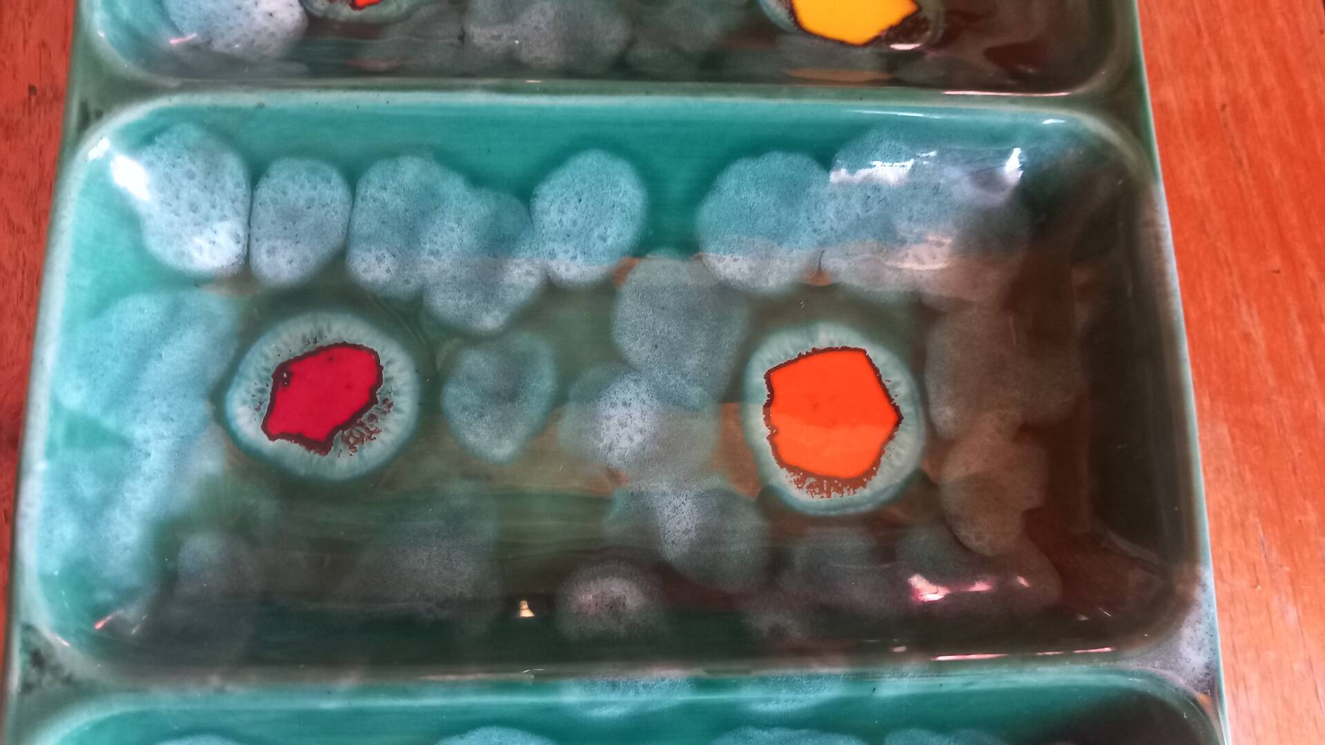 Glazed ceramic dish with compartments attributed to Poët-Laval.