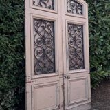 Porte d'entrée cintrée double en chêne, grilles et verre, XIXème
